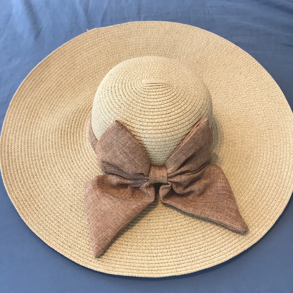 Brown floppy beach/ sun hat with bow